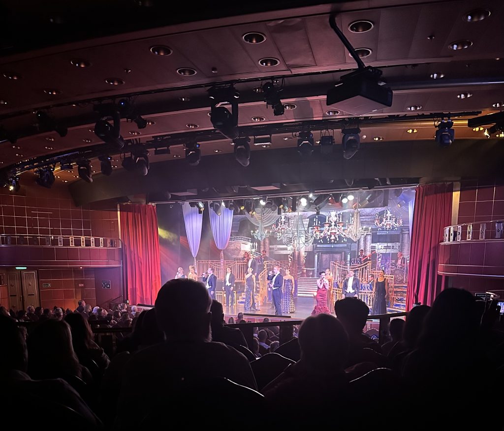 Talented singers and performers on stage during a Princess Cruises theater show

