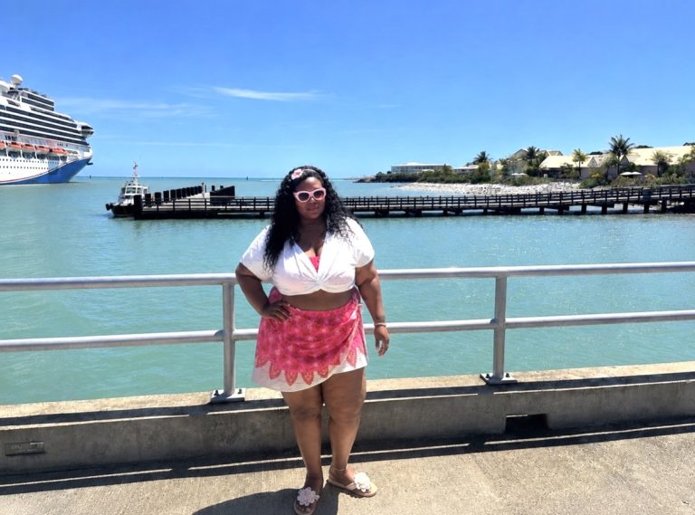 Princess Cruises review thumbnail featuring a Black woman, cruise ship, food, and Grand Turk